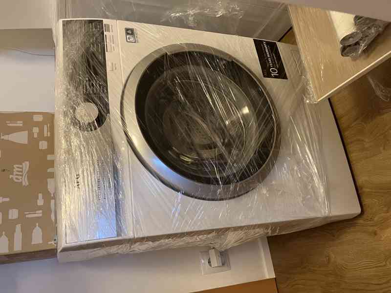 Úzká pračka AEG, 7 kg