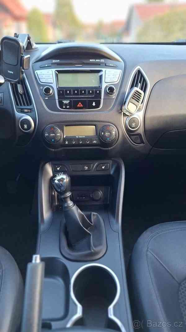 Hyundai ix35 1,6   naj. 91100km - foto 14