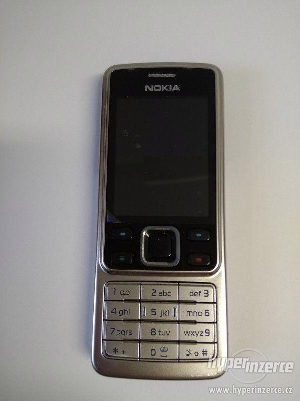 Nokia 6300 stříbrná - foto 1