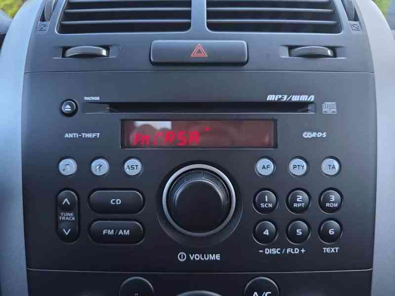 Suzuki Grand Vitara 1.6i. City benzín 78kw - foto 11