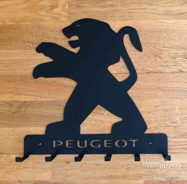 Designový věšák - Peugeot - foto 1