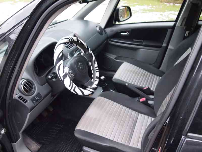 Suzuki SX4 1,6i 4X4 - foto 9