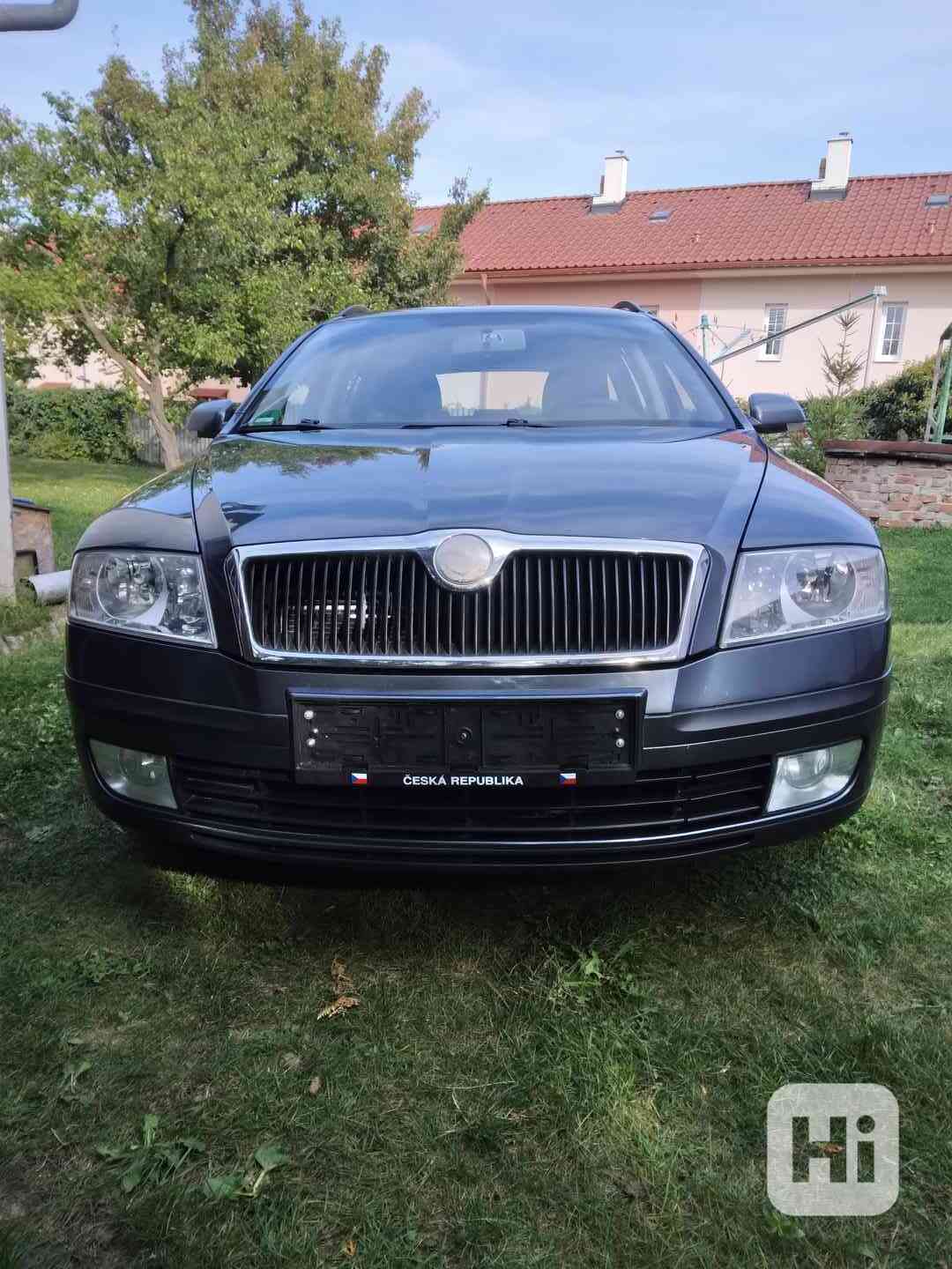 Škoda Octavia combi 1.6 FSI  85 Kw - foto 1