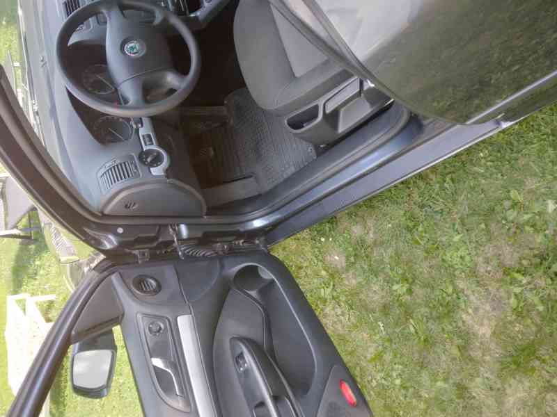 Škoda Octavia combi 1.6 FSI  85 Kw - foto 10