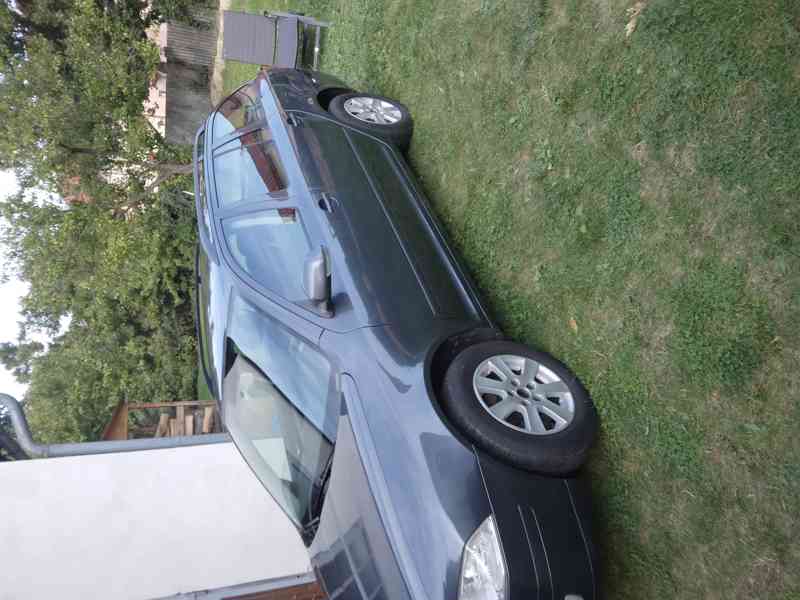 Škoda Octavia combi 1.6 FSI  85 Kw - foto 4