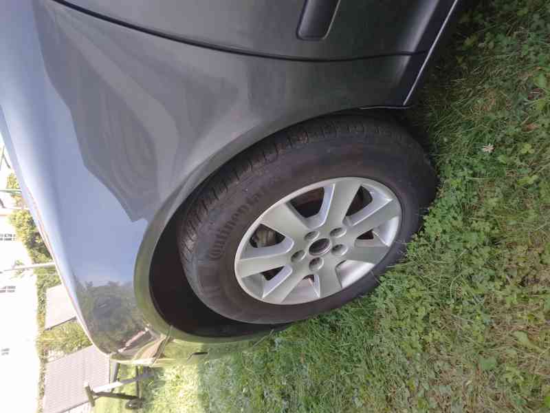 Škoda Octavia combi 1.6 FSI  85 Kw - foto 19