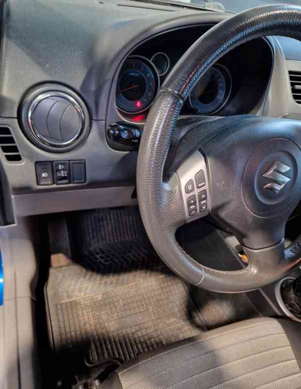Suzuki SX4 1,6i 4x4 benzín 88kw - foto 9