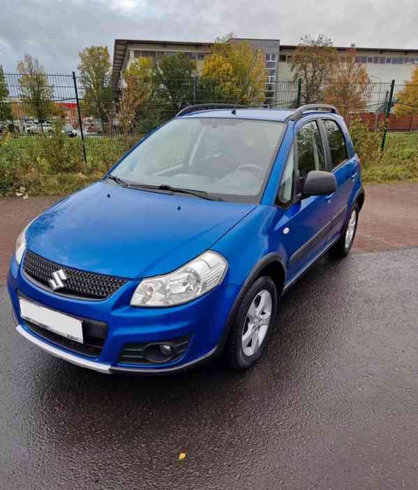 Suzuki SX4 1,6i 4x4 benzín 88kw - foto 14