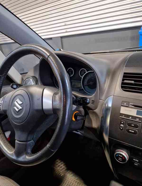 Suzuki SX4 1,6i 4x4 benzín 88kw - foto 10