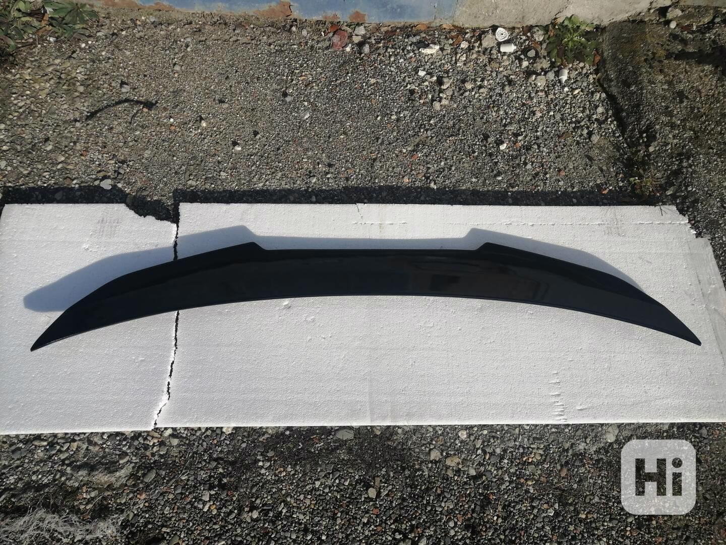 BMW E60 - odtrhová hrana víka kufru. - foto 1