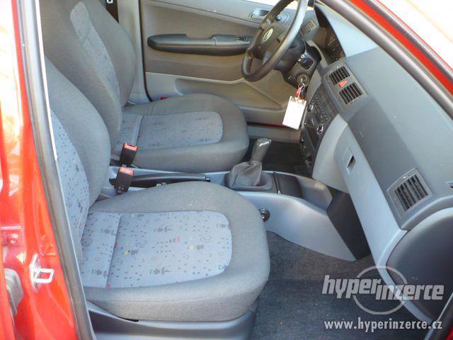 Škoda Fabia 1.2HTP 47kw,model 2004,klima,po servise,slušná - foto 12