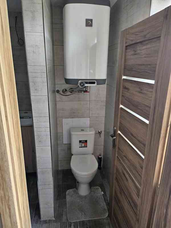 Byt 1+1 po rekonstrukci 41 m² a 2 sklepy - foto 11