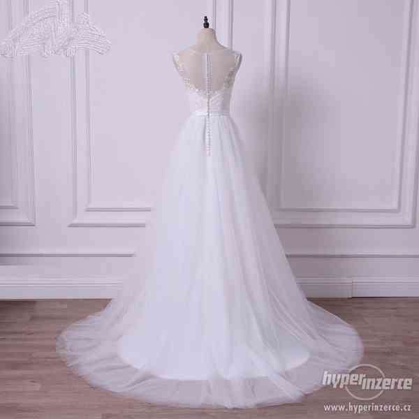 Nové svatební šaty vel. xs-M skladem - foto 2