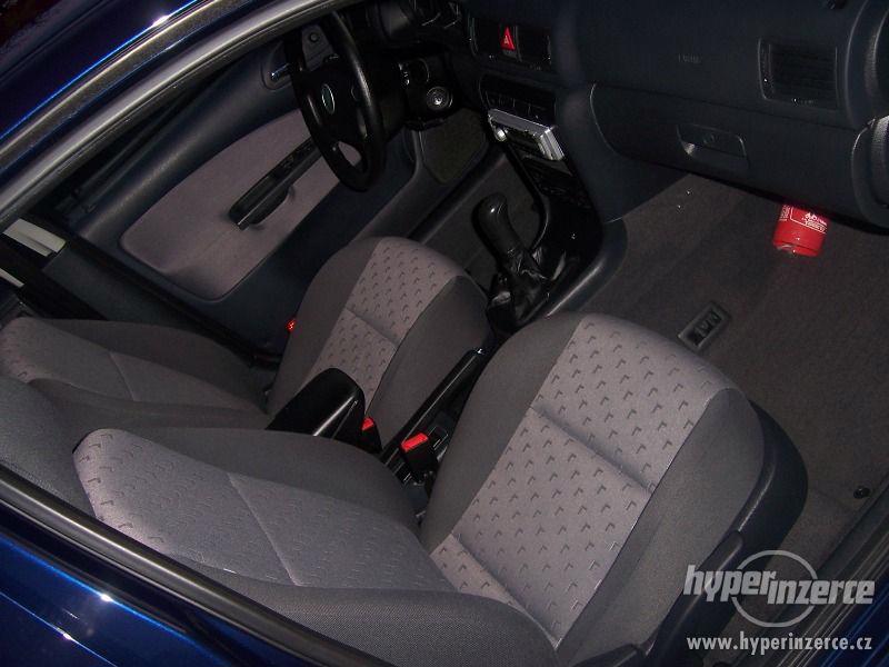 Škoda Octavia 1,9 TDi Temptation - foto 14