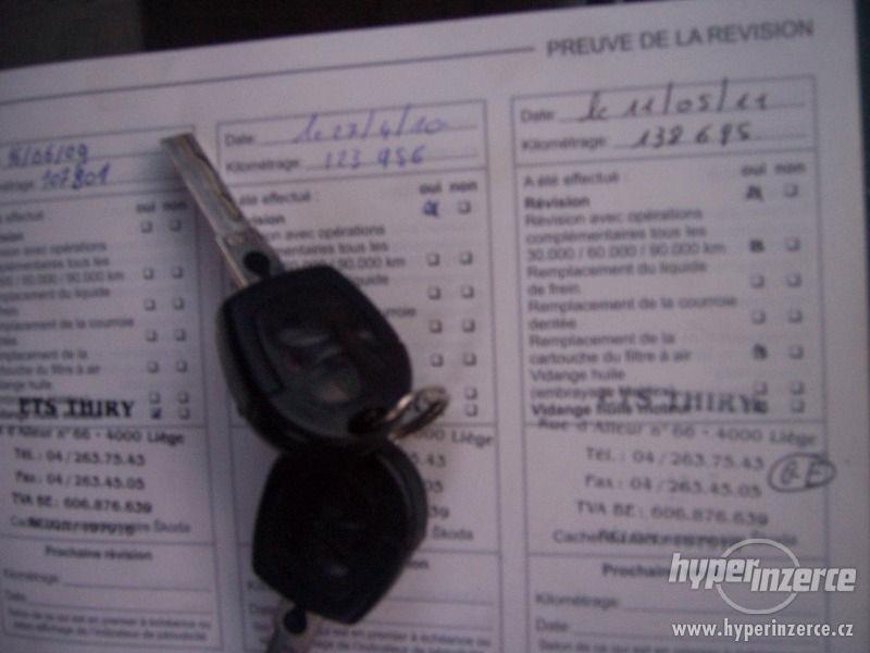 Škoda Octavia 1,9 TDi Temptation - foto 18