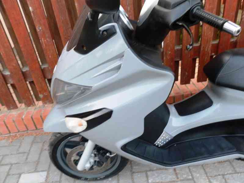 Piaggio X-Evo 125 2012 - foto 24