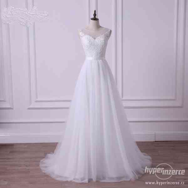 Nové bílé svatební šaty vel. xs-s - foto 1