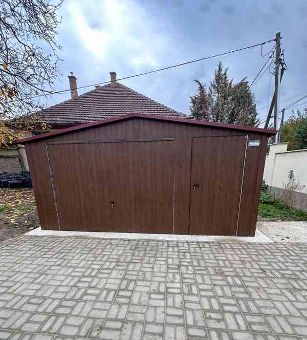 Plechova garáž 5x5m -  výklopná vrata -  dveře - okno TS857 - foto 5