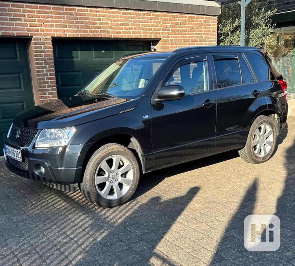 Suzuki Grand Vitara 3.2i V6 20 Jahre Aut. benzín 171kw - foto 1