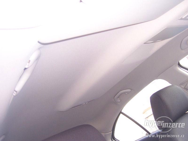 Škoda Octavia II 1,9 TDi - PD - foto 19