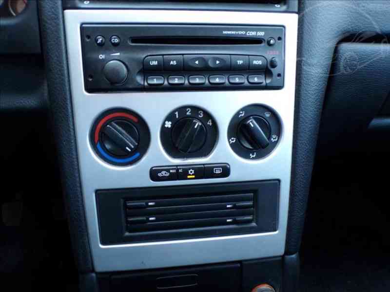 Opel Astra 1,8 i16V SPORT - foto 7