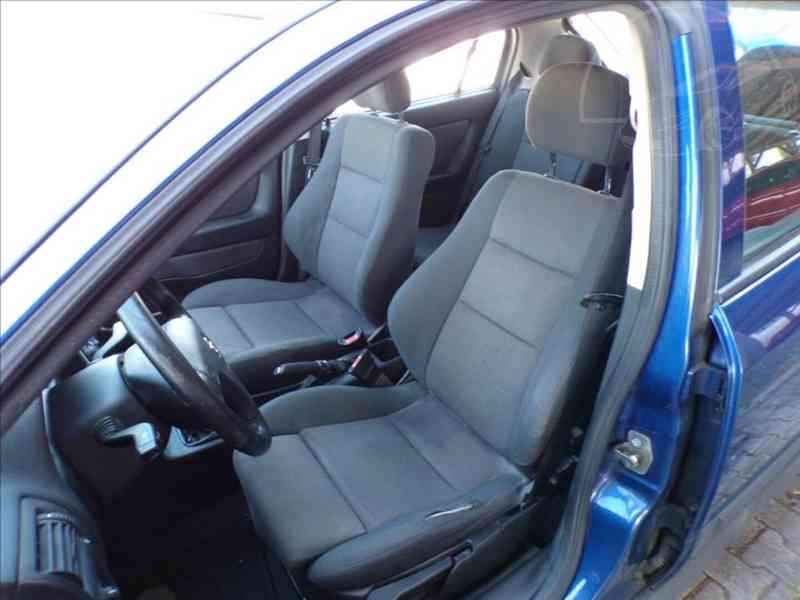 Opel Astra 1,8 i16V SPORT - foto 9