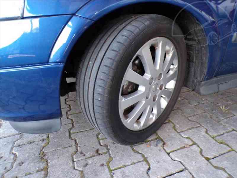 Opel Astra 1,8 i16V SPORT - foto 17