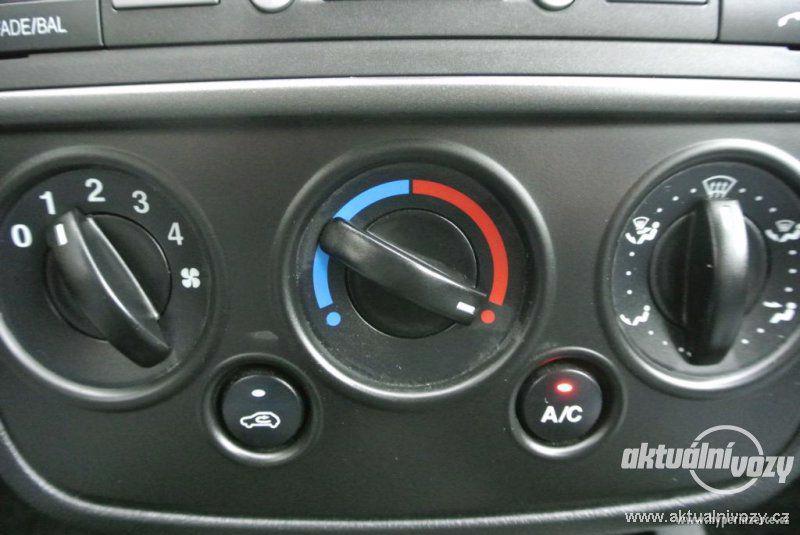 Ford Fiesta 1.3, benzín, r.v. 2006, STK, centrál, klima - foto 24
