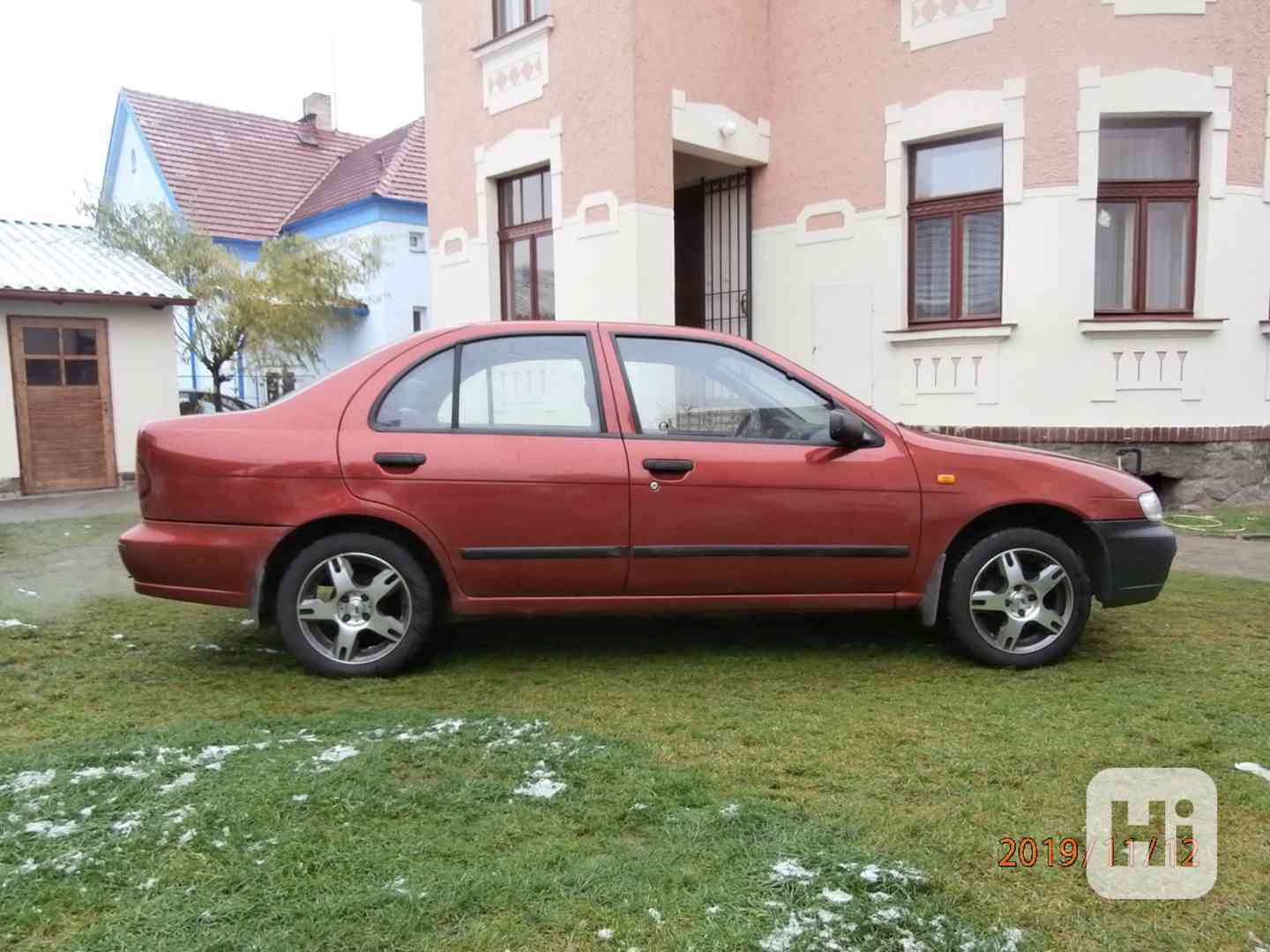 Nissan Almera - foto 1
