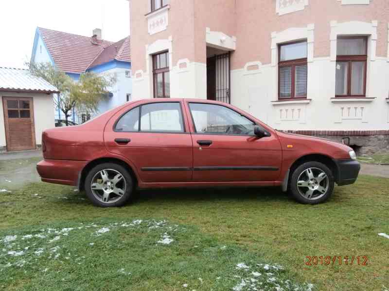 Nissan Almera - foto 1