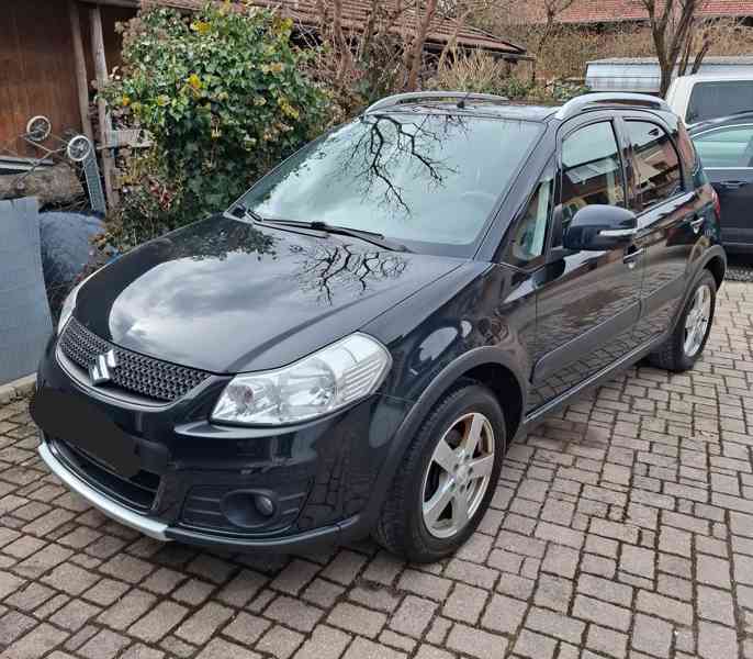 Suzuki SX4 1.6i 4x4 benzín 88kw - foto 7