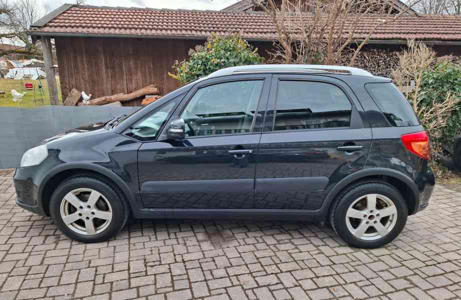 Suzuki SX4 1.6i 4x4 benzín 88kw - foto 14