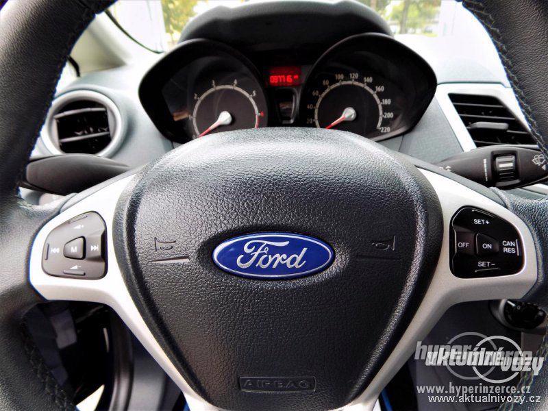 Ford Fiesta 1.2, benzín, r.v. 2009, el. okna, STK, centrál - foto 25