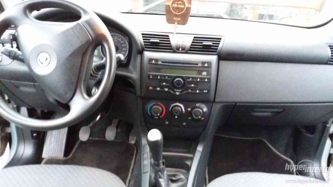 Fiat Stilo 1.9 JTD 59 KW - foto 6