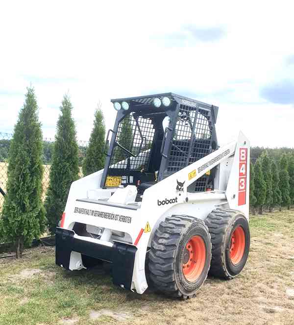 Bobcat 843 smykem řízený nakladač, bagr-nakladač Caterpillar - foto 4