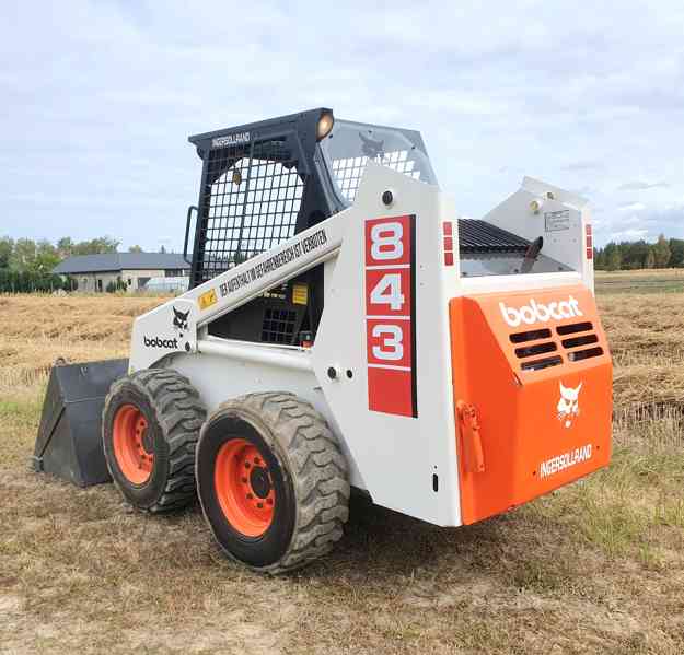 Bobcat 843 smykem řízený nakladač, bagr-nakladač Caterpillar - foto 9