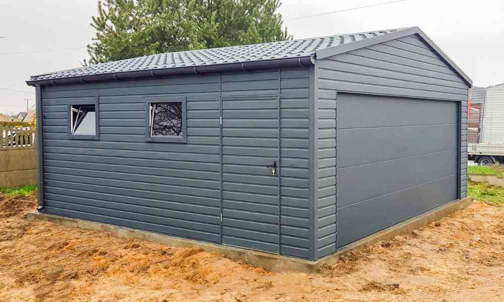 Plechova garáž 6x6m -  sekční vrata -  dveře - 2x okno TS755 - foto 2