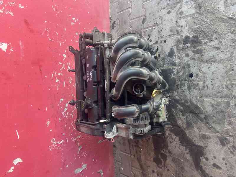 Motor Ford fiesta - Mazda 2 1,25i 55KW FUJA kompl. - foto 1