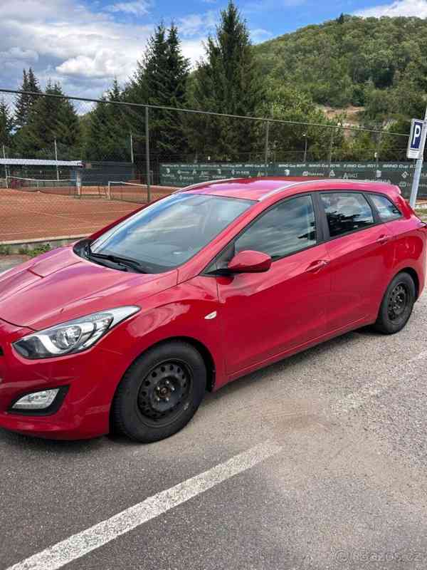 Hyundai i30 1,6   MPI - foto 9