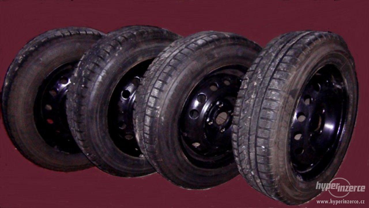 Zimní pneu Opel s disky zánovní 175/65 R14 - foto 1