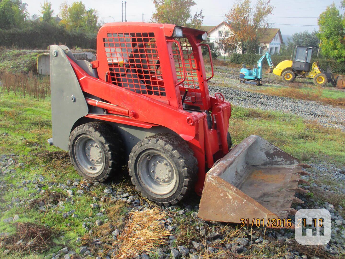 smykový nakladač GEHL 4240 - foto 1