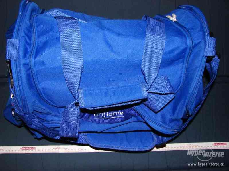 Sportovní modrá taška Oriflame, batoh AlpinePro, cestovní