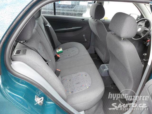 Škoda Fabia 1.4MPI 50kw, pěkná - foto 12