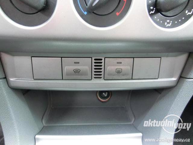 Ford Focus 1.6, benzín, r.v. 2009 - foto 42