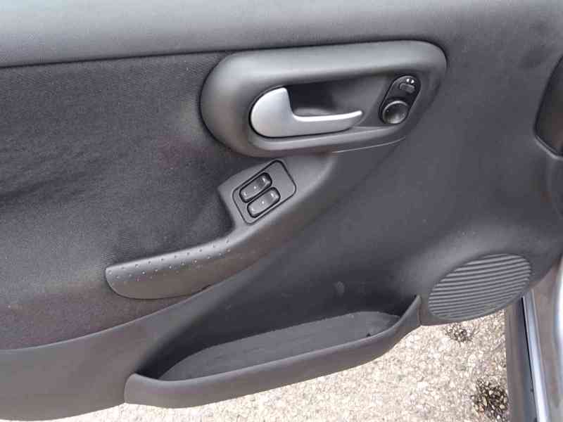 Opel Corsa 1.2i r.v.2005 (klimatizace) - foto 6