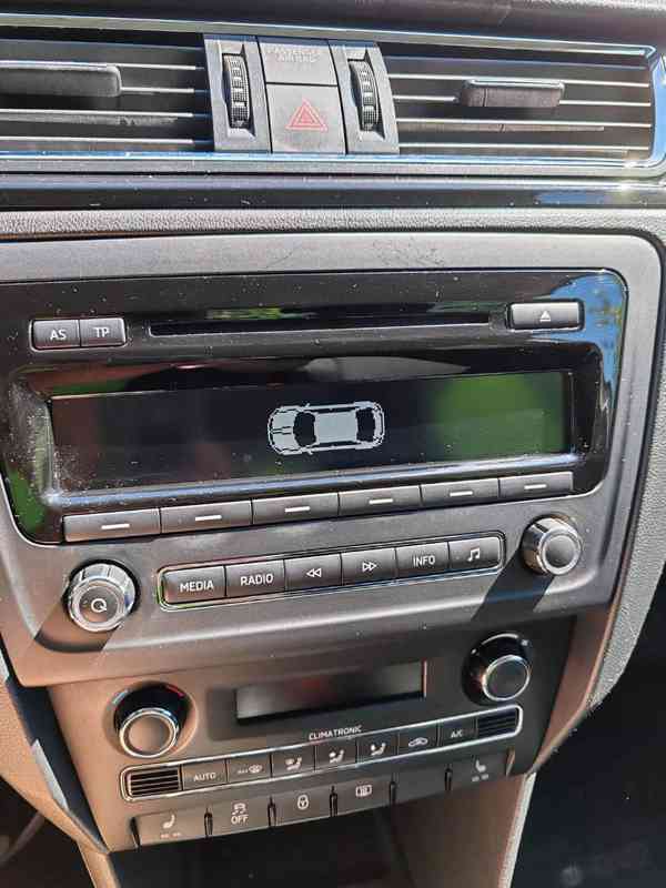Škoda Rapid 1.6 TDI 77 kW Elegance - foto 21