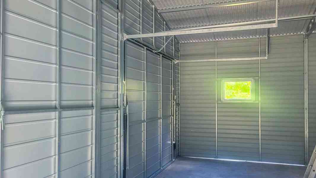 Plechova garáž 7x6m výklopná vrata Dvoukřídlá vrata TS691 - foto 4