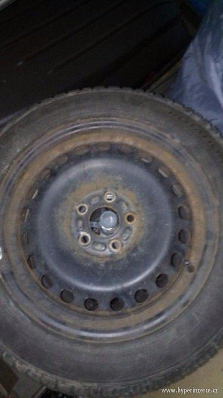 Prodám plechové disky se zimním pneu FORD Mondeo - foto 1