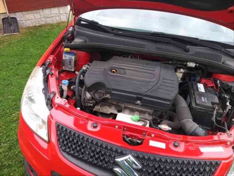 Suzuki SX4 1,6   rok 2013 Lpg 4x4 - foto 19