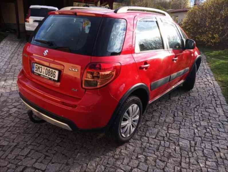 Suzuki SX4 1,6   rok 2013 Lpg 4x4 - foto 20